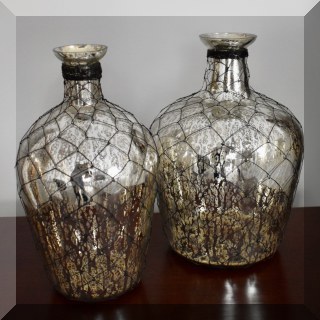 D71. Two mercury glass jugs. 11”h - $16 and $14